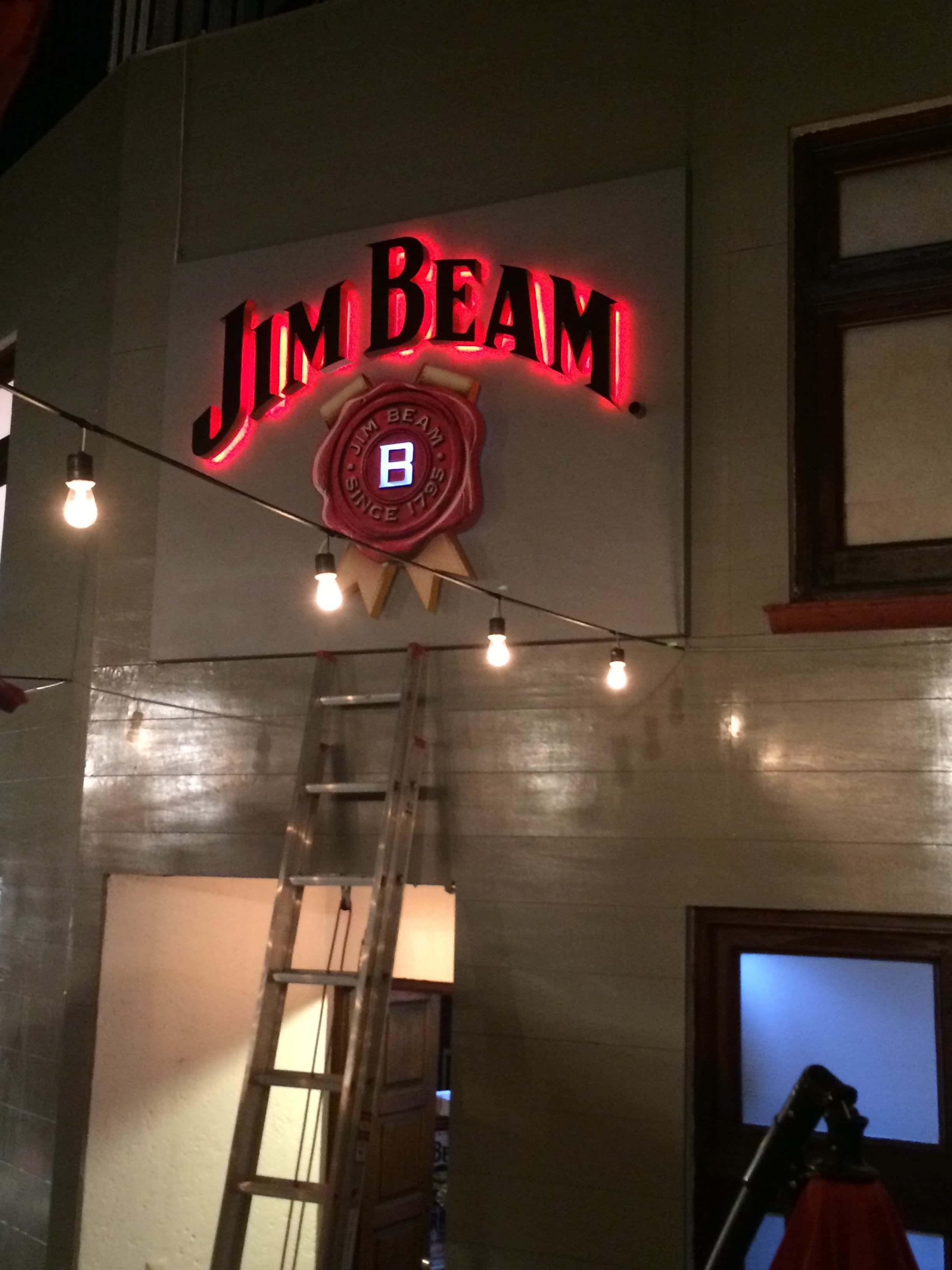 Venue and branded-environment setup before the La Casa de Jim Beam live experience
